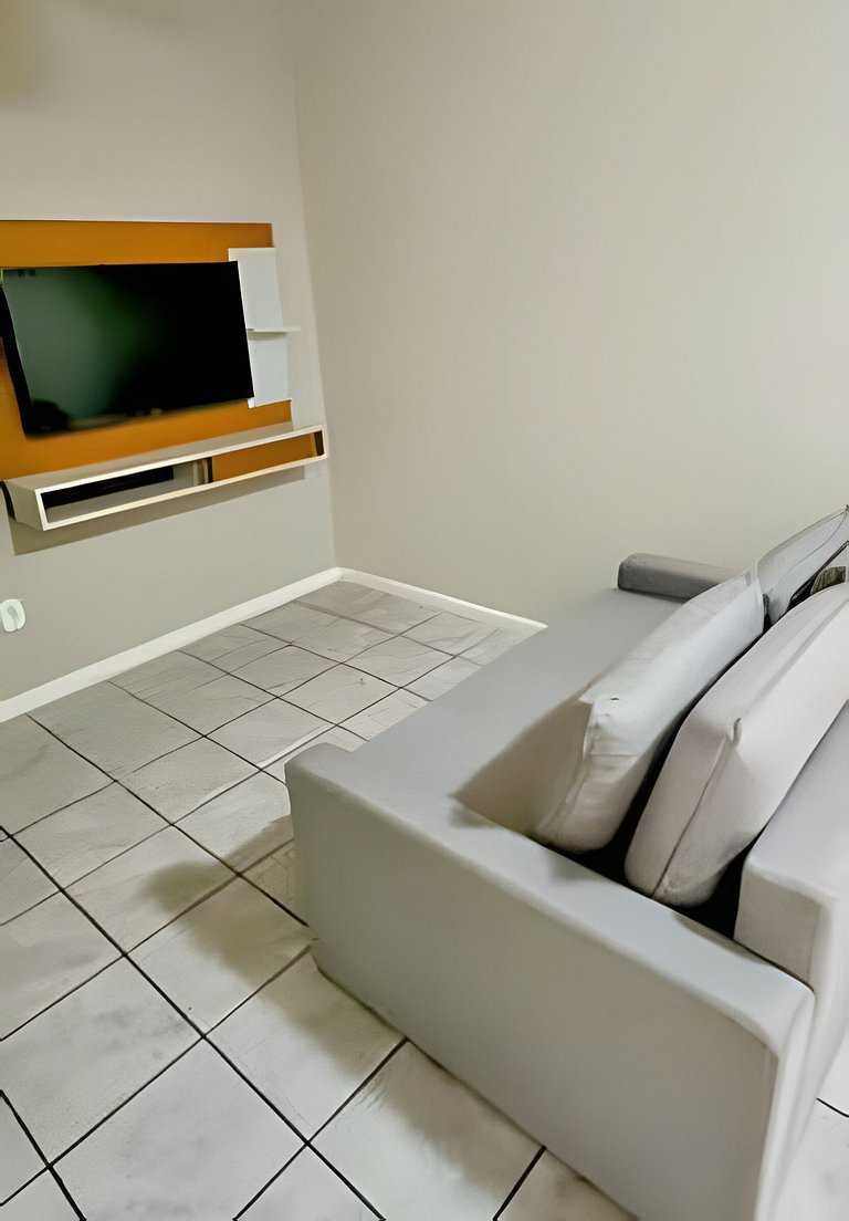 Apartamento Pé na Areia com 2 Quartos e Ar